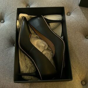 Black Coach heels, never worn